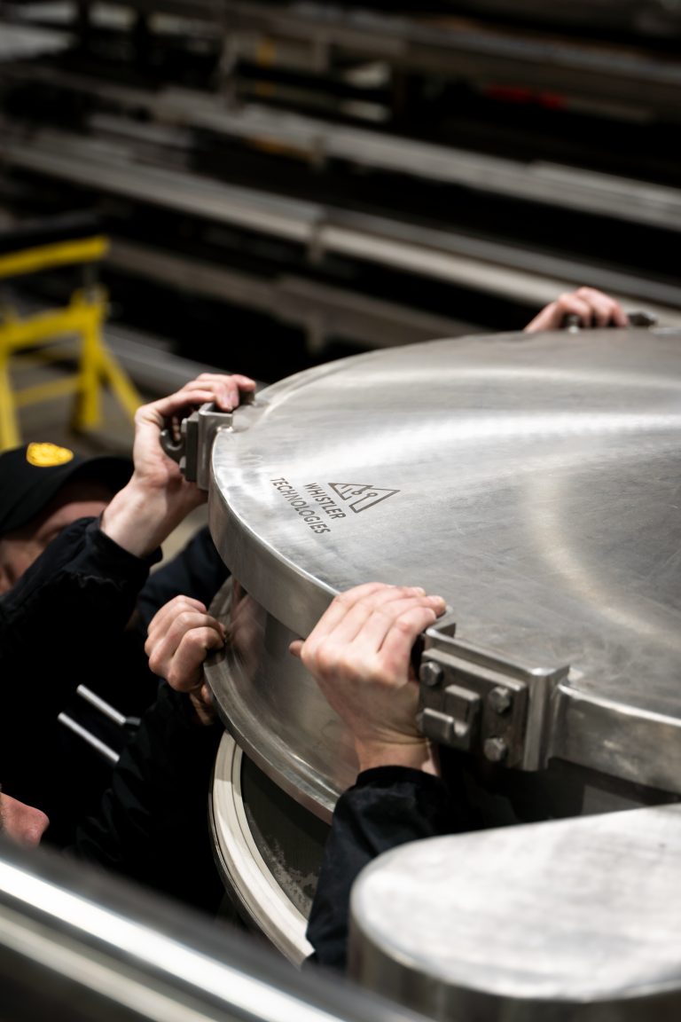 Engineers assisting with installation at a lab