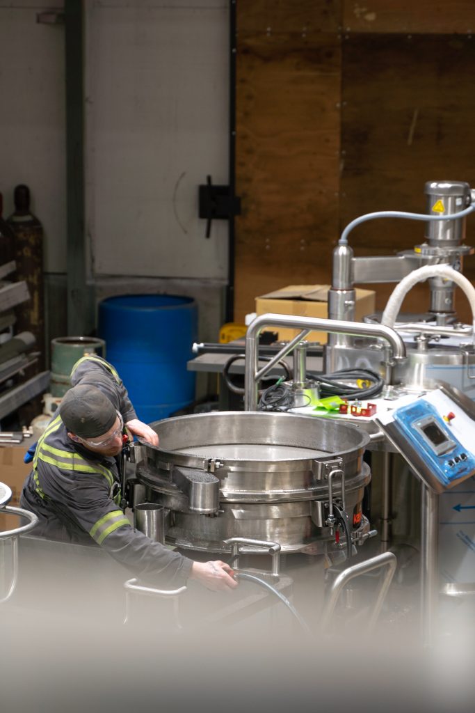 Canadian welder overlooking solventless extraction machine