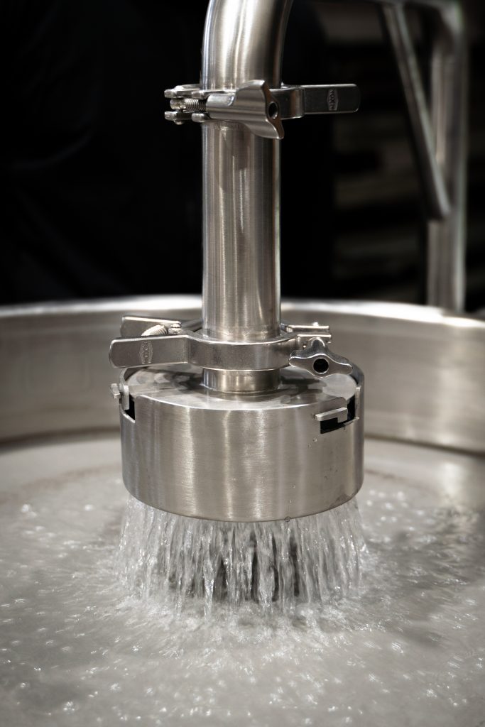 Water coming out of a solventless system's separator shower head